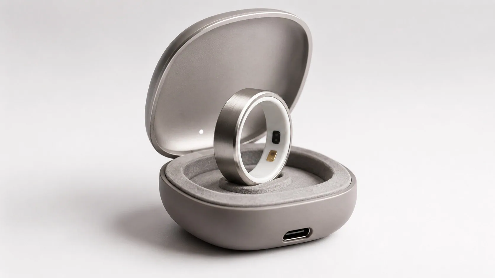 Orbi R1 charging case with ring docked upright, USB-C input and magnetic lid.